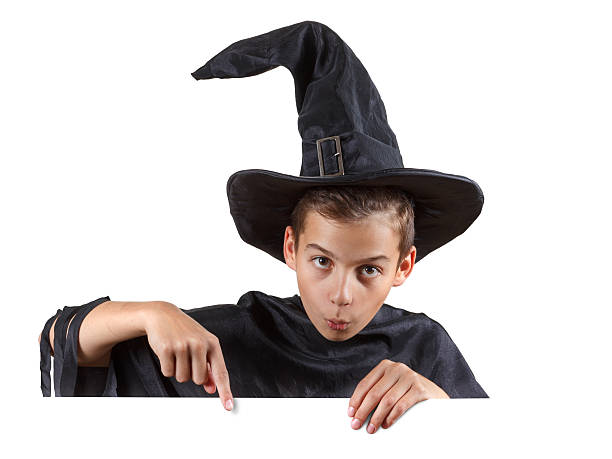 istock Young boy in carnival costume wizard. Isolated on white 491429382