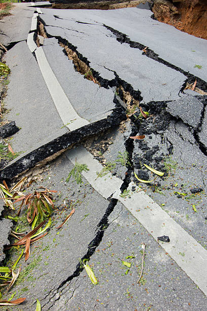 istock broken road by an earthquake in Chiang Rai, thailand 491445787