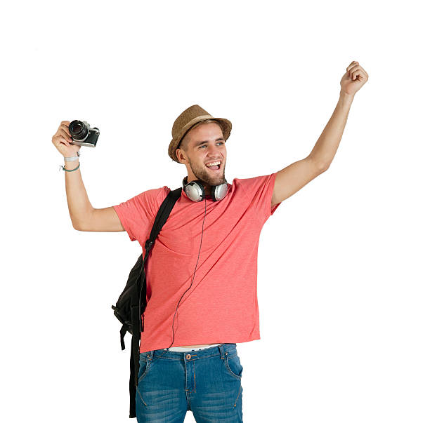 istock Young handsome tourist traveling with camera and backpack 491447123
