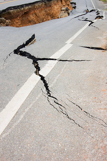 istock broken road by an earthquake in Chiang Rai, thailand 491447183