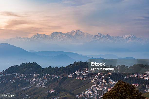 Kanchenjunga Range Peak After Sunset With Darjeeling Town Stock Photo - Download Image Now