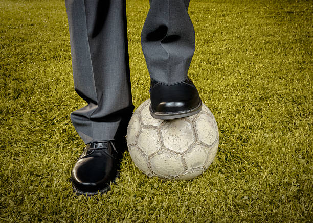 istock Businessman playing with soccer ball - retro-style 491448351