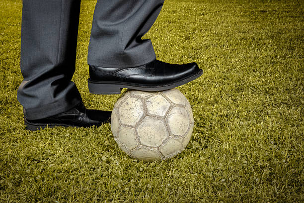 istock Businessman playing with soccer ball - retro-style 491449533