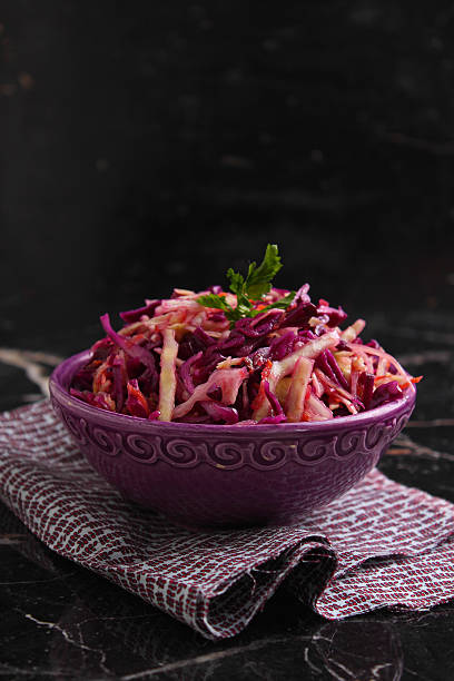 istock salad of red cabbage with apple and carrot 491449760