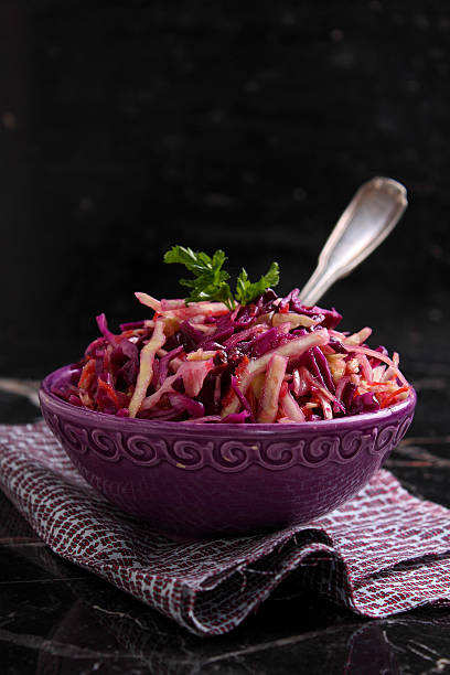 istock salad of red cabbage with apple and carrot 491449806