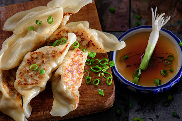 Pork Potstickers Steam Cooked Dumplings chinese dumpling stock pictures, royalty-free photos & images