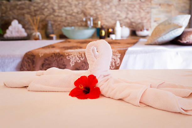 istock Towel decoration on massage table. Spa interior 491450706