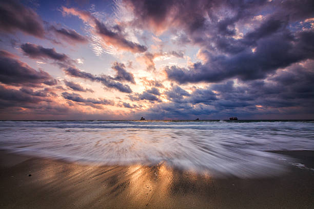 istock Dramatic cloudscape over the sea, sunrise shot 491464206