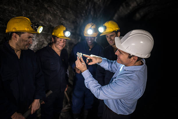istock Engineer showing miners what to look for 491465704