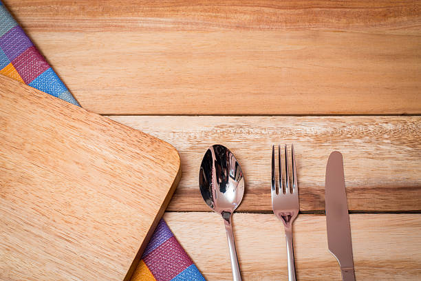 istock Fork, Knife and Table Cloth on wooden background. 491465946