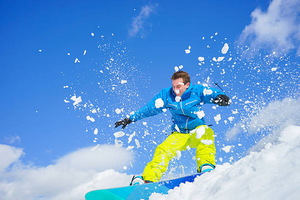 istock young man on the snowboard 491466594