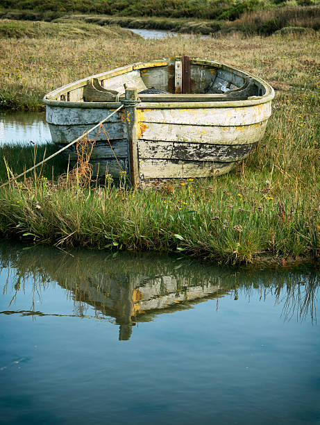istock Boat on the marsh at Brancaster Staithe 491467510