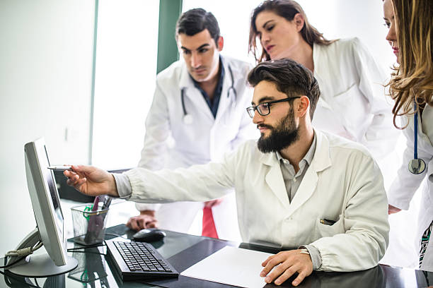 istock Teamwork of doctors in the office for a meeting 491467548
