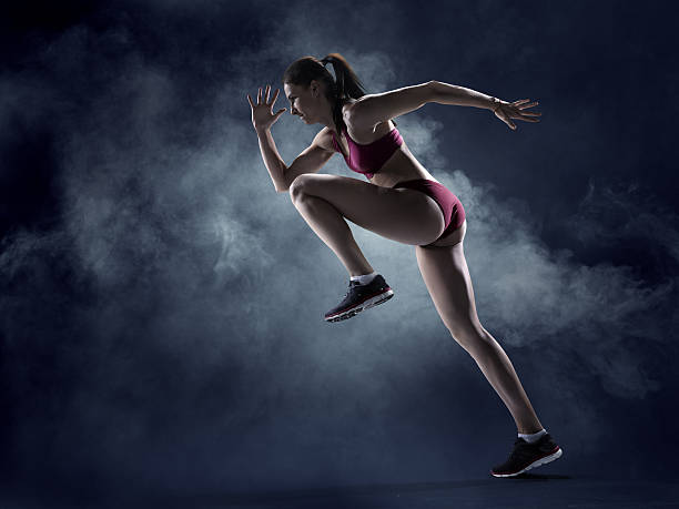 istock Female athlete sprinting 491469388
