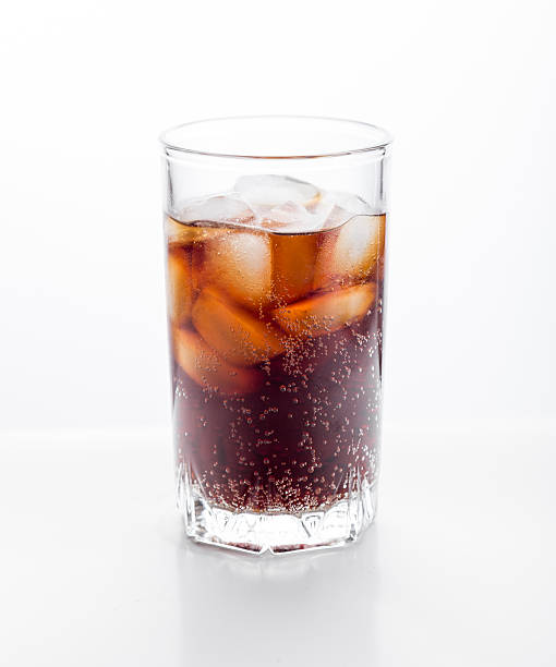 istock Cola glass with ice cubes on a white background 491469744