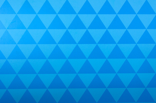 Blue triangle geometric abstract background texture.
