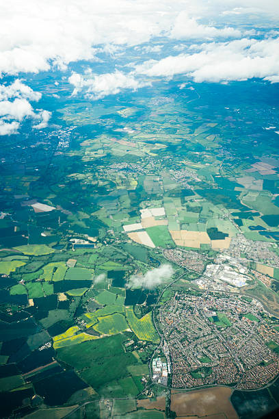 Full frame aerial view of a rural town, Kent, UK, Europe.  Full frame, daylight, vertical composition. Nobody, cartographic and travel background. 