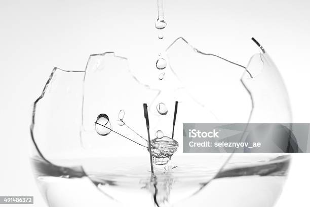 The Water In The Broken Electric Lamp Stock Photo - Download Image Now - 2015, Backgrounds, Circle