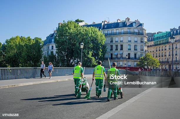 Sanitation Workers With Garbage Carts Stock Photo - Download Image Now - Sanitation Worker, Summer, 2015