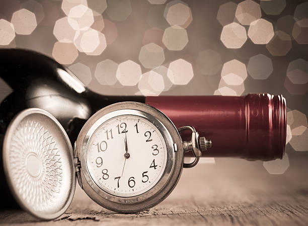 New Year's clock and wine at midnight