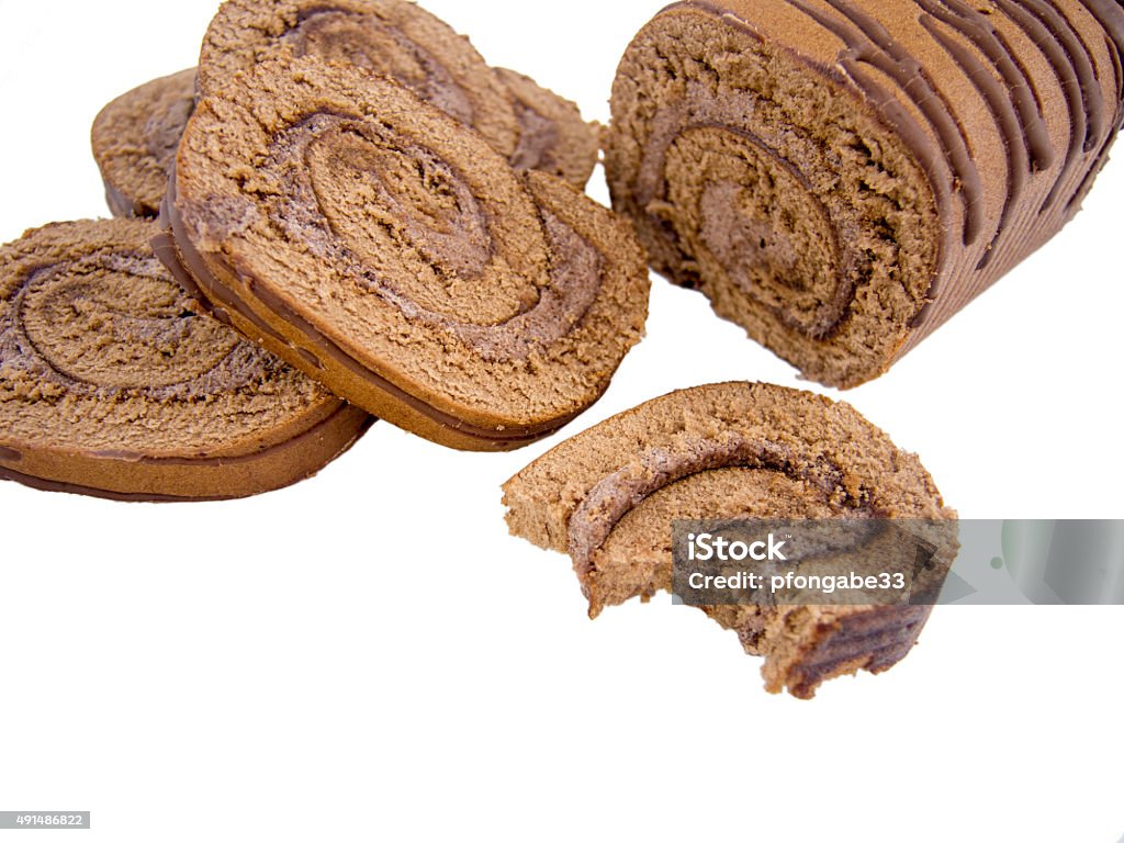 sweet chocolate roulade sliced and isolated sweet chocolate roulade sliced and isolated  2015 Stock Photo