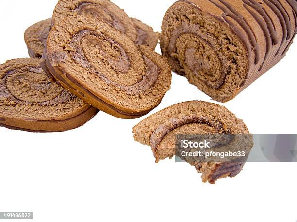 Sweet Chocolate Roulade Sliced And Isolated Stock Photo - Download Image Now - 2015, Baked, Baked Pastry Item