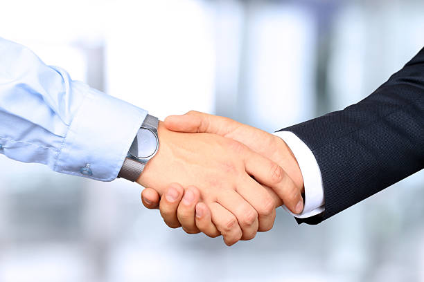 istock The firm handshake  between two colleagues 491488050
