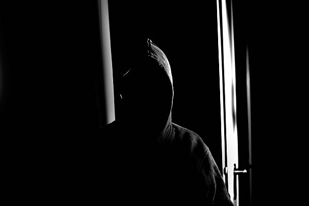 istock dangerous man in the shadow 491489472