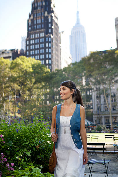 istock Woman enjoy in city park 491489480