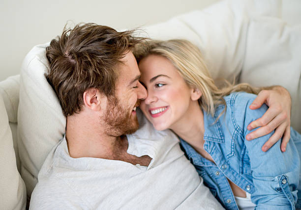 Loving couple relaxing at home