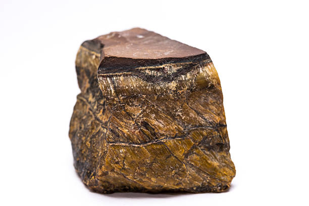 This gemstone is a member of the quartz group with a golden to red-brown colour. Within its matrix are asbestos fibers usually occurring in layers, which makes Tiger eye a chatoyant gemstone, meaning the fibers of the stone reflect in a wavering silky luster that resemble the eye of a cat.