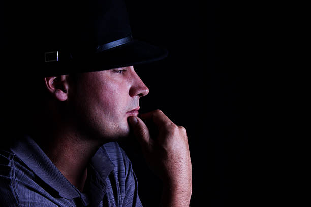 istock Low Key Photo of Man Touching His Chin 491496280
