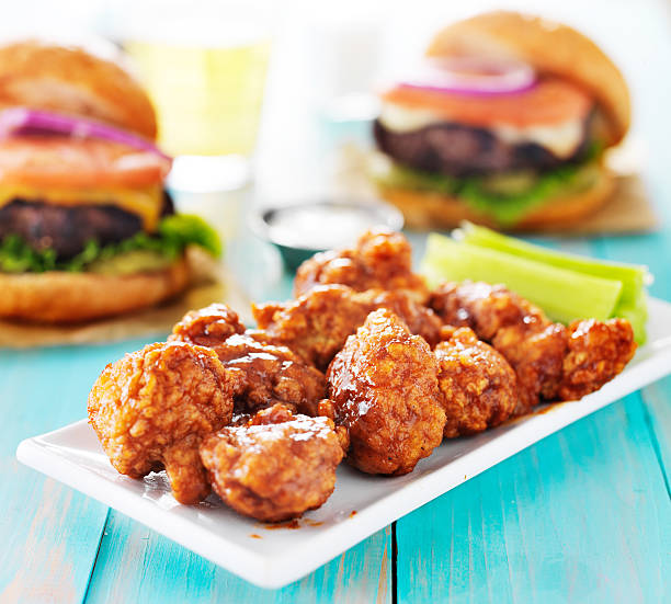 istock boneless barbecue chicken with burgers and beer 491496778