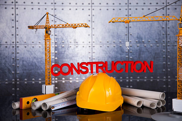 istock Crane, Safety helmet, Blueprints and construction site 491498998