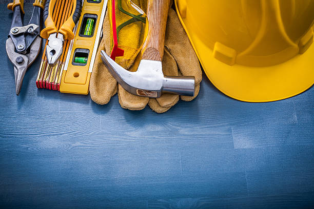 istock Composition of construction tools on wooden board horizontal vie 491499594