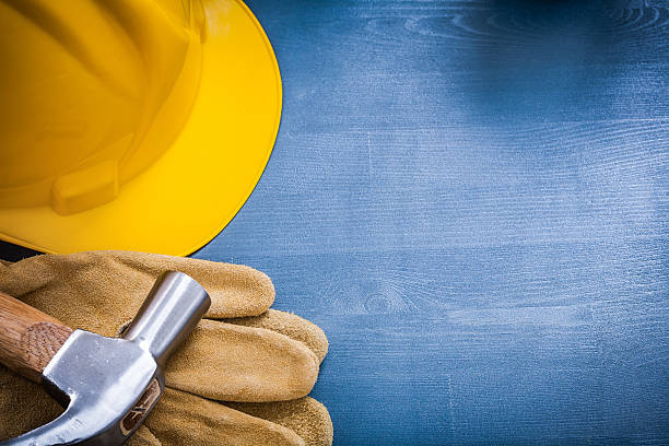 istock Copyspace of hard hat claw hammer leather protective gloves 491499692