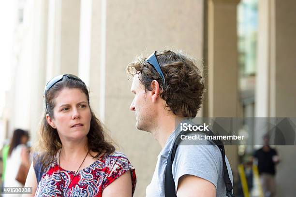 Beautiful Young Couple Talking On The Street Copy Space Stock Photo - Download Image Now