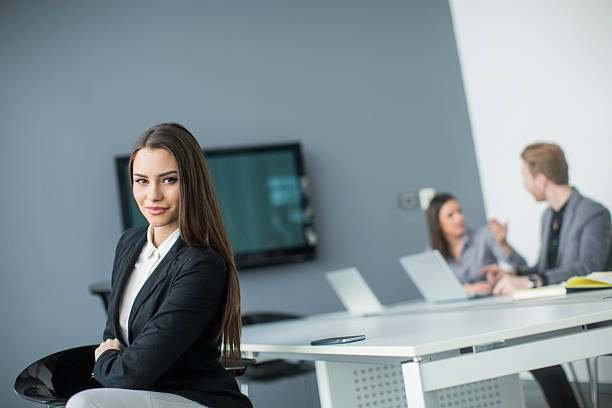 istock Young woman in the office 491511494