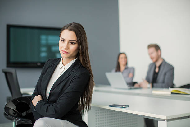 istock Young woman in the office 491511528