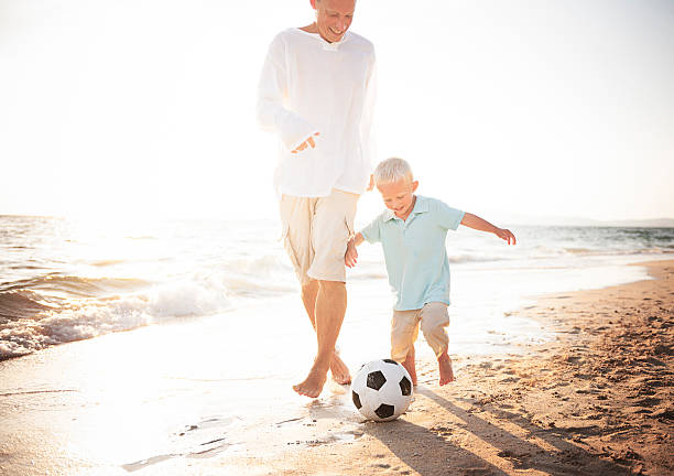 istock Family playing on the beach Happiness Concept 491514572