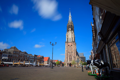 Delft, Netherlands - May 13, 2014; Nieuwe Kerk with it's characteristic clock tower on the Markt, the central market square, in Delft