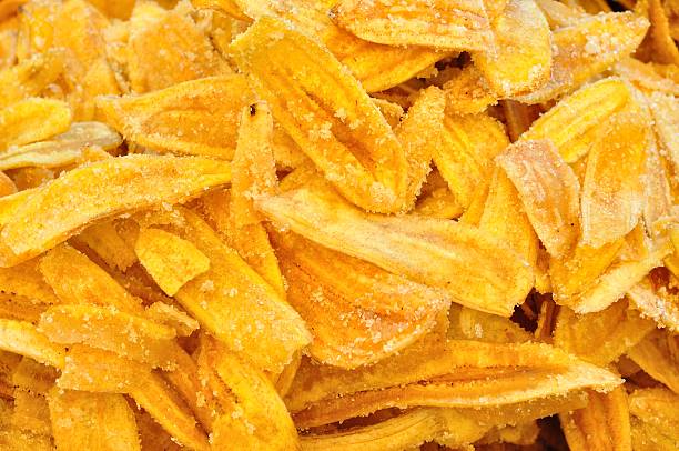 istock Fried thinly sliced banana chips, a tropical snack 491517383
