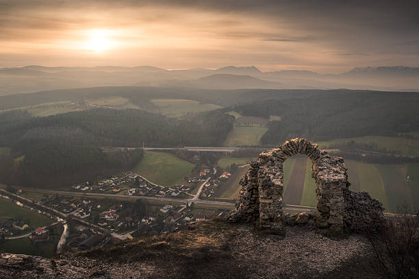 istock Ancient Ruins with Mountains and Village in Background 491517427