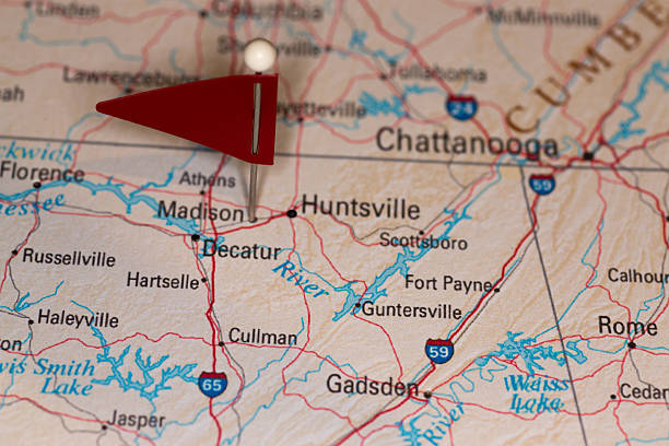 Madison, AL, USA - Cities on Map Series A map pin with a red flag pinpoints the city on a select area from a high quality map.  The red flag creates highlighted copy space for text. alabama state map with cities stock pictures, royalty-free photos & images