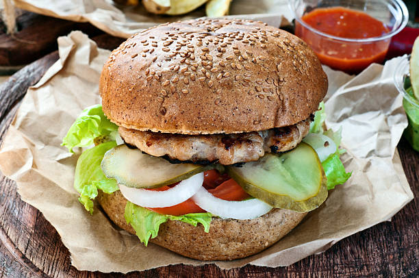 istock Fresh burger with sauce on paper 491518992