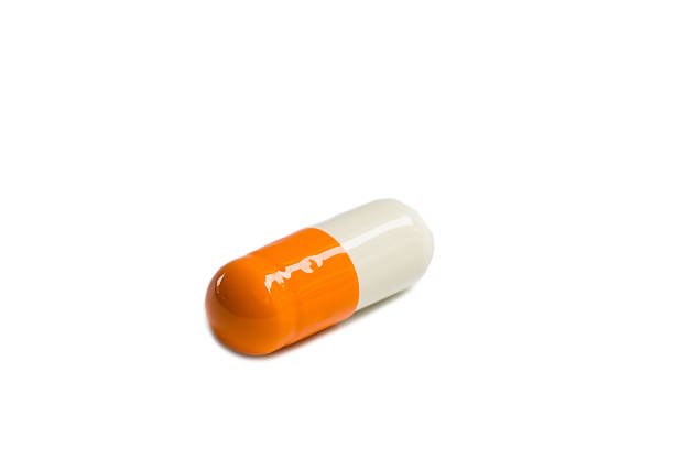 istock Medical capsules isolated on white background 491521095
