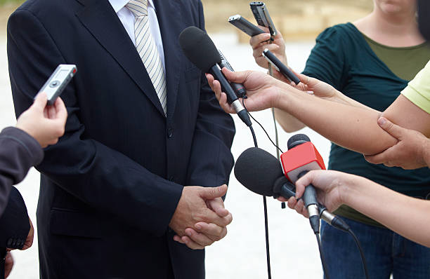istock business meeting conference journalism microphones 491522611