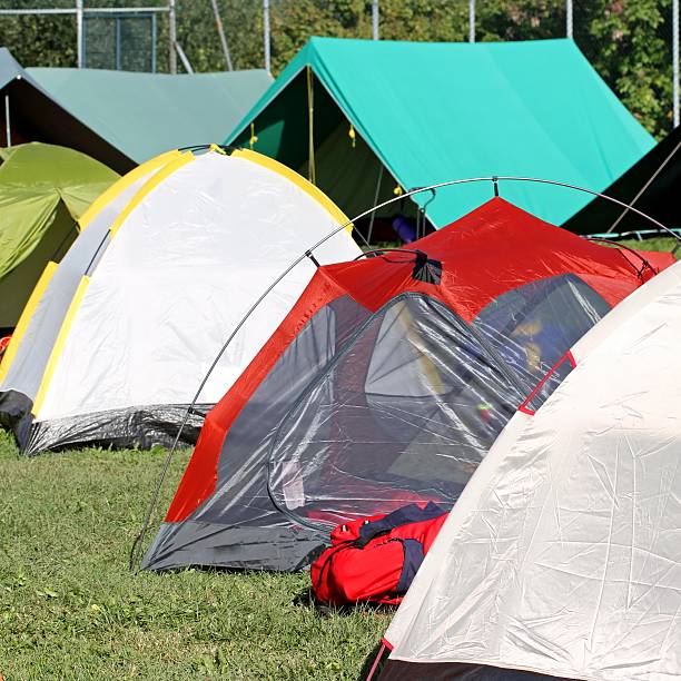 istock tents in a soccer field 491522793