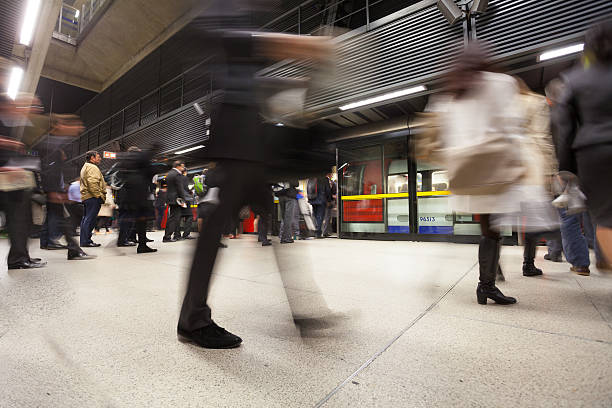 istock Blur Movement people in Rush Hour train station, London, UK 491523851