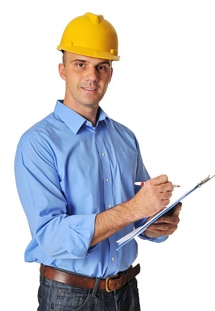 istock Successful handsome engineer with helmet writing on isolated white background 491523963